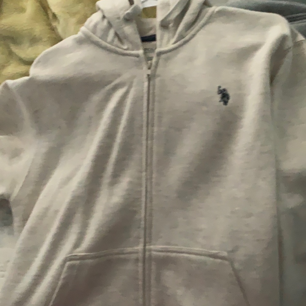 Polo assassi zip up